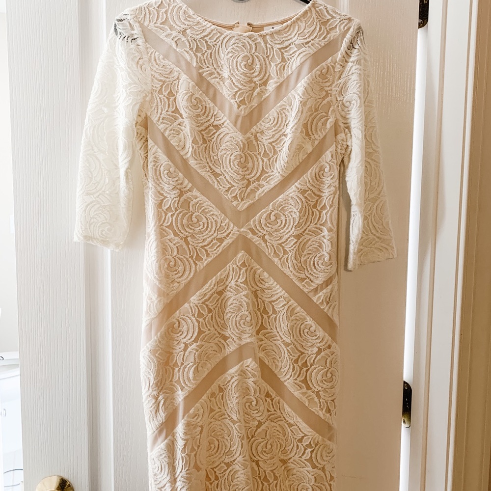 Size 6 Half sleeve white lace dress. Above knees
